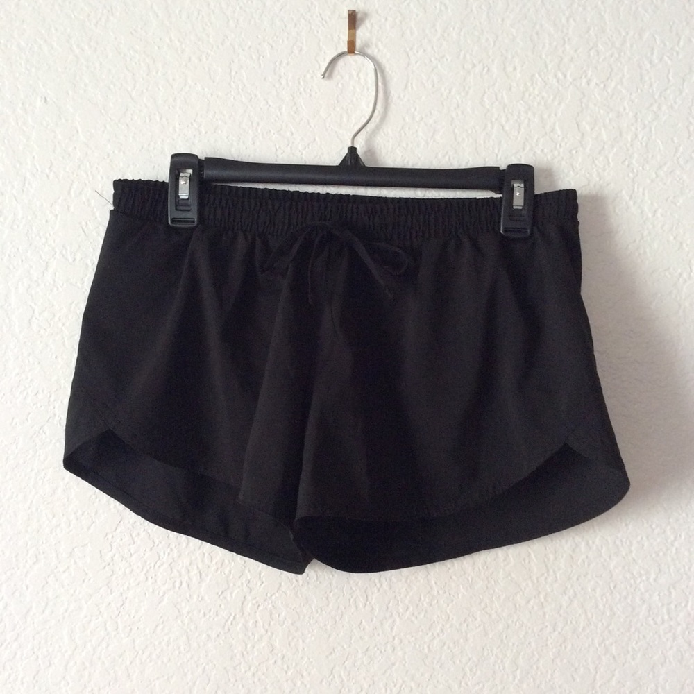 Black Brief-Lined Dolphin Hem Workout Shorts